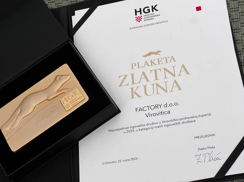 HGK Zlatna kuna plaque beside Factory’s certificate naming it the most successful small company in Virovitica-Podravina County for 2025.
